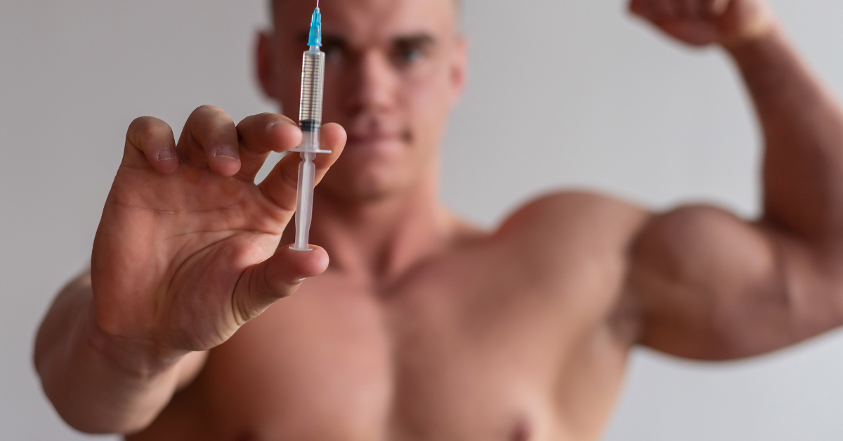 A bodybuilder with a syringe of testosterone