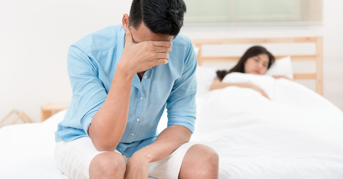 A frustrated man due to his low sex drive towards his wife